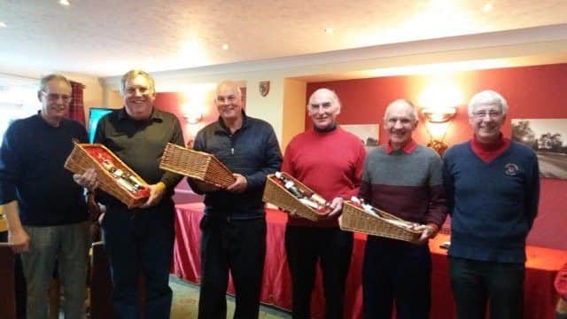 The winning team with vice-captain Dick Chapman (left) and seniors captain George Schmidt (right) EMN-171227-110440002