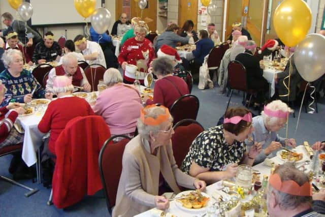 Guests enjoy their Christmas Day lunch at Melton Mowbray Baptist Church PHOTO: Supplied
