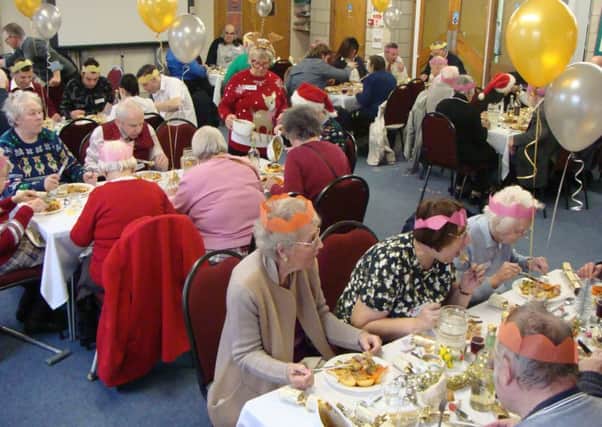 Guests enjoy their Christmas Day lunch at Melton Mowbray Baptist Church PHOTO: Supplied