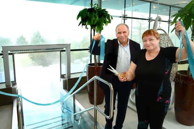 Co-owner Michael Isaacs and Ragdale guest Judy Court officially open the new rooftop pool PHOTO: Lionel Heap