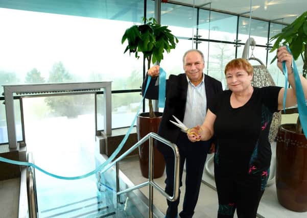 Co-owner Michael Isaacs and Ragdale guest Judy Court officially open the new rooftop pool PHOTO: Lionel Heap