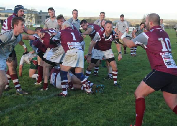 Action from Melton RFC's Boxing Day match EMN-180301-104840002