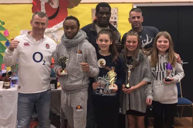 Assassins award winners with head coach Mark Barlow