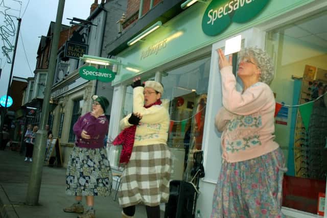 The Dancing Grannies perform outside of Specsavers for shop relaunch event PHOTO: Tim Williams