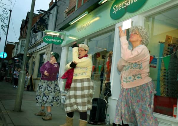 The Dancing Grannies perform outside of Specsavers for shop relaunch event PHOTO: Tim Williams