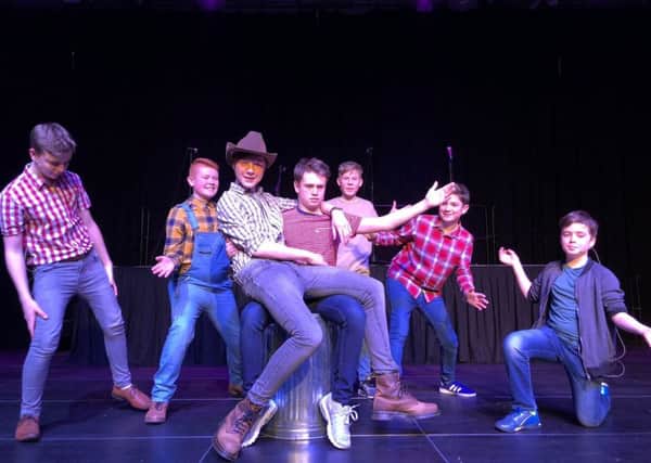 Male members of the cast rehearsing Footloose PHOTO: Supplied