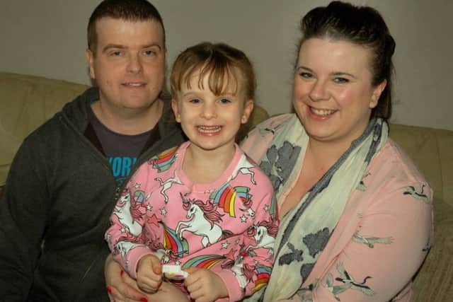 Andrew Ogleby, who is having treatment for cancer, with his partner Cassandra Jane and their daughter Imogen-Rose Ogleby- Jones. EMN-180115-115506001