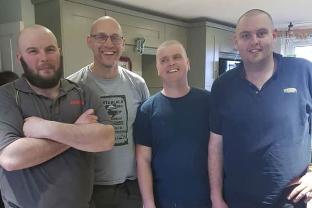 Andrew Ogleby (second from right) with, from left, brother David and friends Colin Madams and Elliott Spratlin, after having their heads shaved to support Andrew in his cancer treatment EMN-180116-135059001