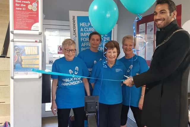 Row event for Parkinson's UK. Pictured is Margaret Cramp (left), other participants and Mayor of Melton Tejpal Bains PHOTO: Supplied
