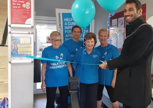Row event for Parkinson's UK. Pictured is Margaret Cramp (left), other participants and Mayor of Melton Tejpal Bains PHOTO: Supplied