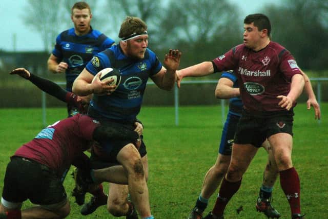 Charlie Loveday lines up a tackle against maurauding Syston EMN-180130-113551002