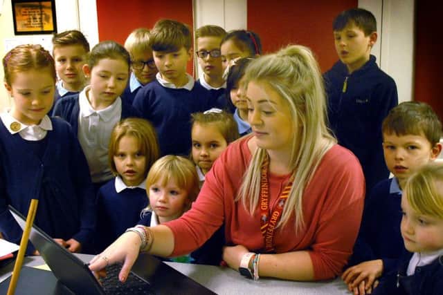 Katie Fudge, ICT co-coordinator at Swallowdale Primary School, goes through some internet safety points with pupils EMN-180129-143222001