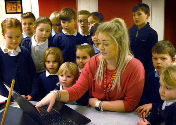 Katie Fudge, ICT co-coordinator at Swallowdale Primary School, goes through some internet safety points with pupils EMN-180129-143222001