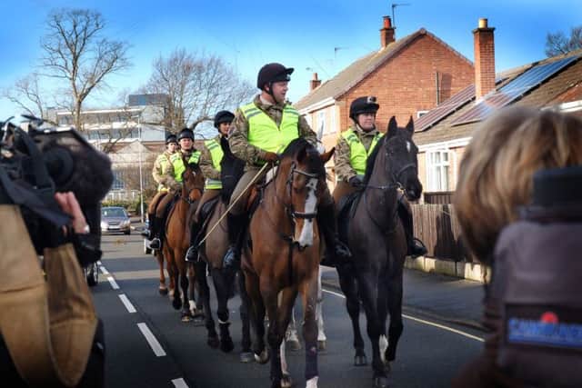 Defence Animal Centre (DAC) horses arrive outside Joan Hart's house to celebrate her 100th birthday EMN-180129-103015001
