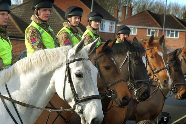 Defence Animal Centre (DAC) horses on parade outside Joan Hart's house to celebrate her 100th birthday EMN-180129-103004001