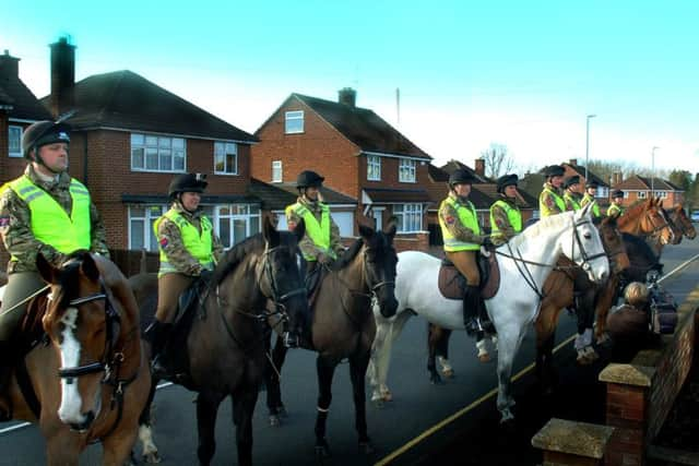 Defence Animal Centre (DAC) horses on parade outside Joan Hart's house to celebrate her 100th birthday EMN-180129-103056001