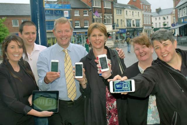 Melton Bid directors and managers Siobhan Lane, Mark Cook, Andrew Cooper, Shelagh Core, Julie Swain and Sarah Browne celebrate the launch of free wifi in the town EMN-180602-103837001