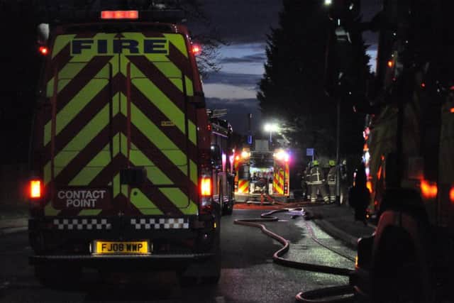 Firefighters outside a house in Station Lane at Asfordby after a fire was reported on Sunday
PHOTO Jonathan McGrady/JM News EMN-180502-115634001