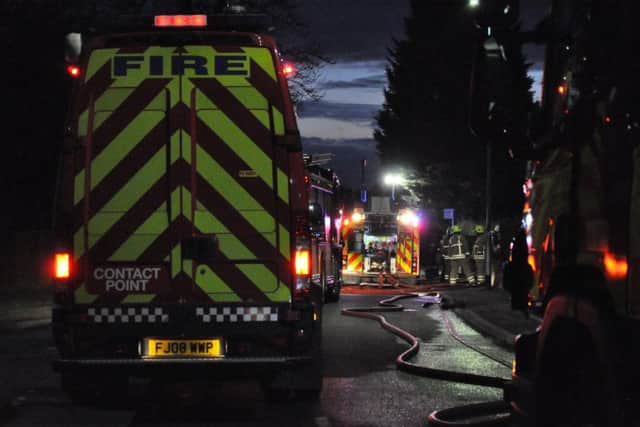 Firefighters outside a house in Station Lane at Asfordby after a fire was reported on SundayPHOTO Jonathan McGrady/JM News EMN-180502-115634001
