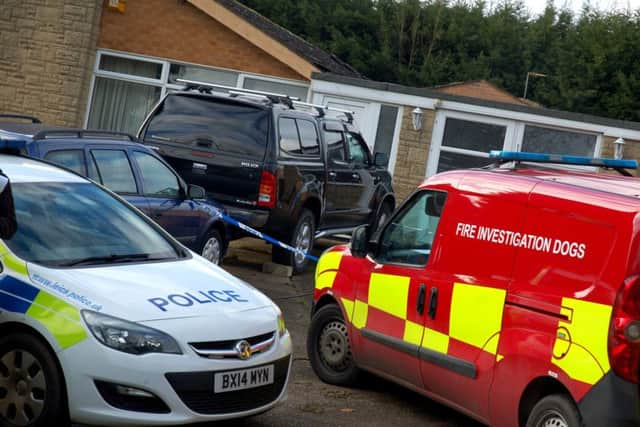 The scene this week outside the bungalow in Station Lane, Asfordby, where a blaze is the subject of an investigation by police and the fire service EMN-180602-101545001