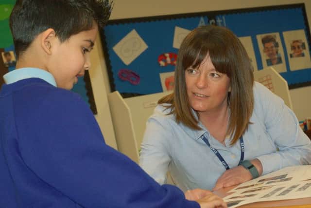 Autism lead teacher Amy Dunstan with Raahi Patel at Birch Wood Area Special School at Melton EMN-180602-172626001