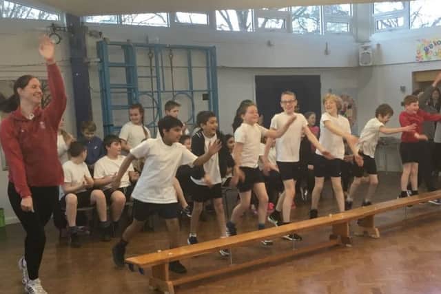 Olympian Joanne Jackson tests pupils fitness at Queniborough Primary School PHOTO: Supplied