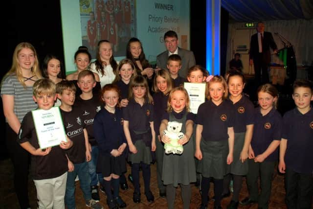 Junior Team of the Year, Priory Belvoir Academy Year 8 Girls, with sponsor Colin Moulds, and finalists Long Clawson Primary School cross country and Melton RFC Under 10s EMN-180802-225742002
