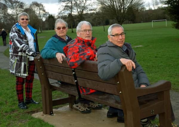 Friends of Melton Country Park members Jean Forbes, Walter Pepper, Bill Forbes and Mick Hipwell try out the new bench which has been installed in the park EMN-180213-143403001