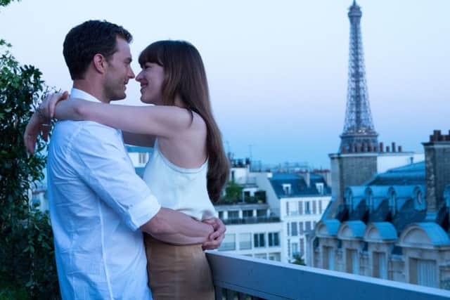 Jamie Dornan as Christian Grey and Dakota Johnson as Anastasia Steele PHOTO: PA Photo/Universal Pictures/Doane Gregory