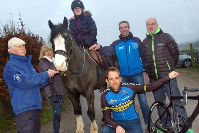 CiCLE Classic race director Colin Clews (second from right) and Metaltek rider Dan Fleeman and directeur sportif Colin Sturgess (right) with members of the Mount Group RDA EMN-180214-170115002