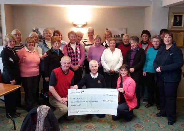 Melton Mowbray Golf Club ladies, with chairman Phil Millward, hand over the cheque to the RNLI EMN-180220-114544002