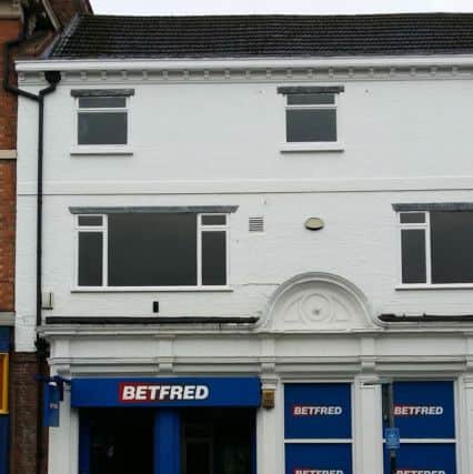 The old Post Office in Sherrard Street, Melton, which is now a betting shop EMN-180220-095504001