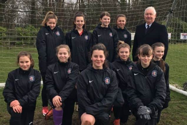 Mowbray Rangers Girls in their new rain jackets with sponsor John Southerington EMN-180220-183708002