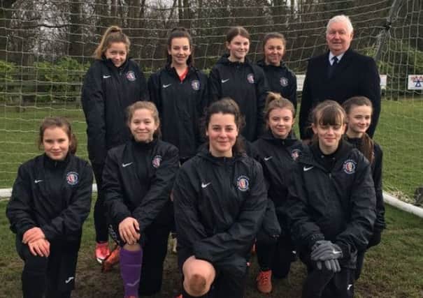 Mowbray Rangers Girls in their new rain jackets with sponsor John Southerington EMN-180220-183708002
