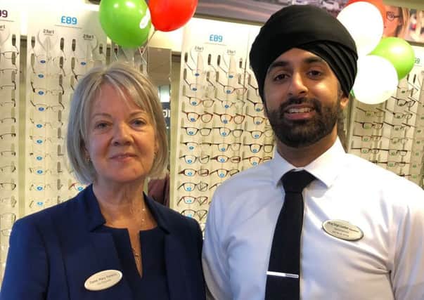 Optometrist Dilraj Gumber and Specsavers founder Dame Mary Perkins eye up the camera PHOTO: Supplied