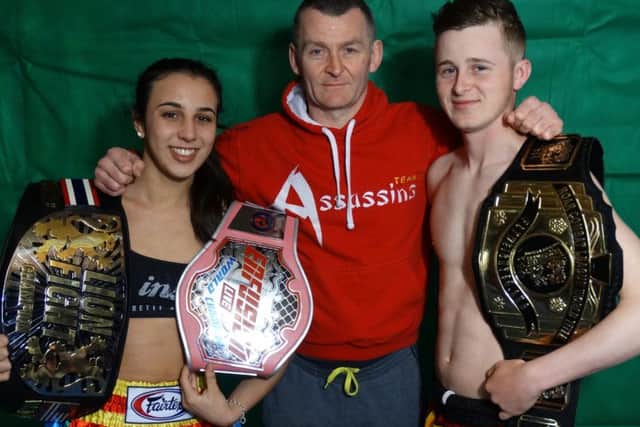 Iman Barlow, pictured with coach and dad Mark and brother Thai EMN-180221-132627002
