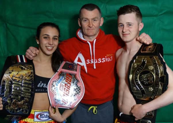 Iman Barlow, pictured with coach and dad Mark and brother Thai EMN-180221-132627002