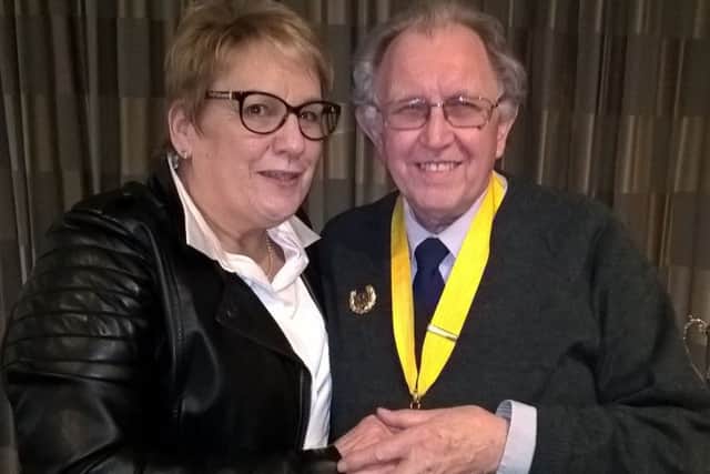 Bill Stanley receives his award from CTT national chairwoman Sheila Hardy EMN-180227-124127002