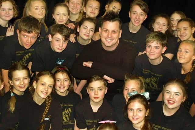All Together Now TV star Dylan Hutchinson with some members of Melton's Performing Stars Academy EMN-180226-155526001