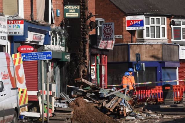 Emergency personnel continue to work at the scene on Hinckley Road in Leicester, where four people were killed, after a suspected explosion and subsequent fire destroyed a shop. PRESS ASSOCIATION Photo. Picture date: Monday February 26, 2018. Four other people remain in hospital, one with serious injuries. See PA story POLICE Explosion. Photo credit should read: Joe Giddens/PA Wire EMN-180228-085907001