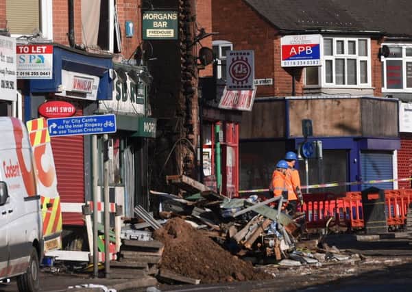 Emergency personnel continue to work at the scene on Hinckley Road in Leicester, where four people were killed, after a suspected explosion and subsequent fire destroyed a shop. PRESS ASSOCIATION Photo. Picture date: Monday February 26, 2018. Four other people remain in hospital, one with serious injuries. See PA story POLICE Explosion. Photo credit should read: Joe Giddens/PA Wire EMN-180228-085907001