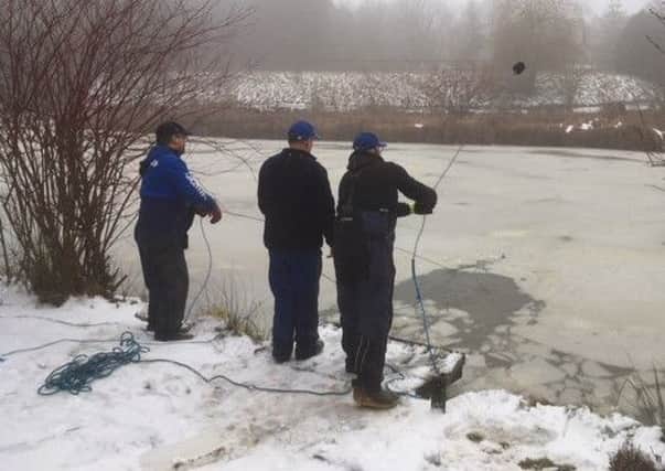 Frozen lake and sub-zero temperatures won't keep the Asfordby and Melton Society of Anglers from their sport EMN-180603-181209002