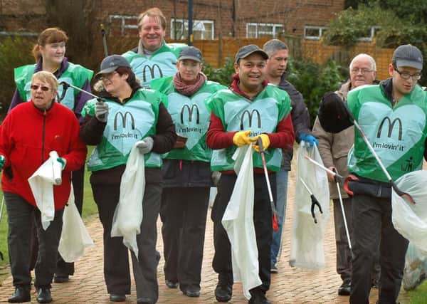 Melton councillors and staff from MacDonald's join forces to pick litter from Melton streets EMN-180103-131832001