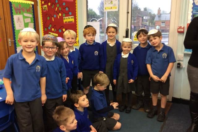 Whissendine pupils embracing different faiths PHOTO: Supplied