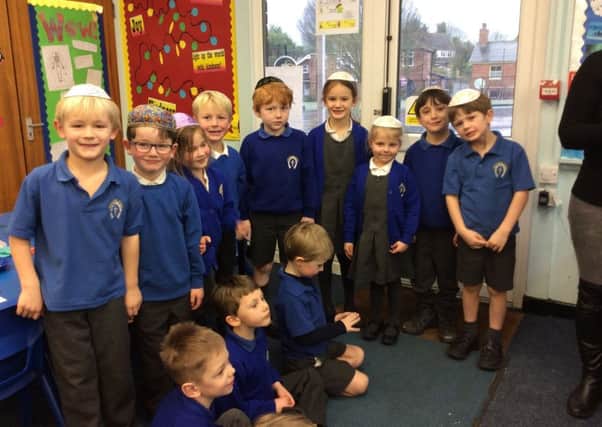 Whissendine pupils embracing different faiths PHOTO: Supplied