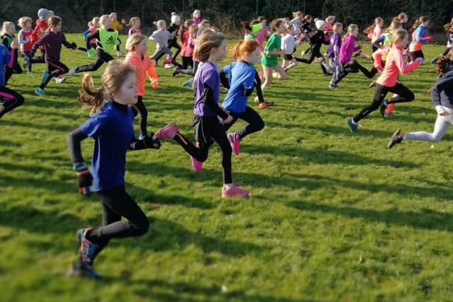 Action from the Year 3 and 4 girls' race EMN-180503-181417002