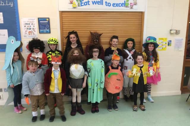 Teachers and pupils at Frisby Primary School dressed up as their favourite book characters. Staff dressed up as characters from the same book and the children were invited to make guesses as to which book they were from PHOTO: Supplied