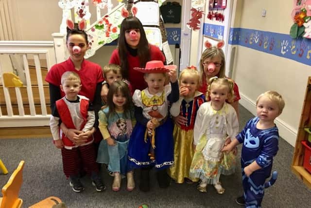 Children and staff from Early Years Nursery on Norman Way, Melton, dressed up for World Book Day and brought their favourite books to share with their friends PHOTO: Supplied