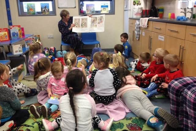 Children and staff from Early Years Nursery based at Swallowdale Primary School dressed in their pyjamas for World Book Day and snuggled down for bedtime stories PHOTO: Supplied