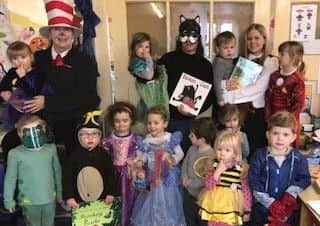 Children and staff from Frisby Pre-school dressed up for World Book Day. They had Oi Frog, Monkey puzzle, Cinderella, Anna, Bumblebee, Spider-Man, Iron Man, Elsa, The Gruffalo, Batgirl, The Cat in the Hat, Splat the Cat and Hermionne Grainger PHOTO: Supplied